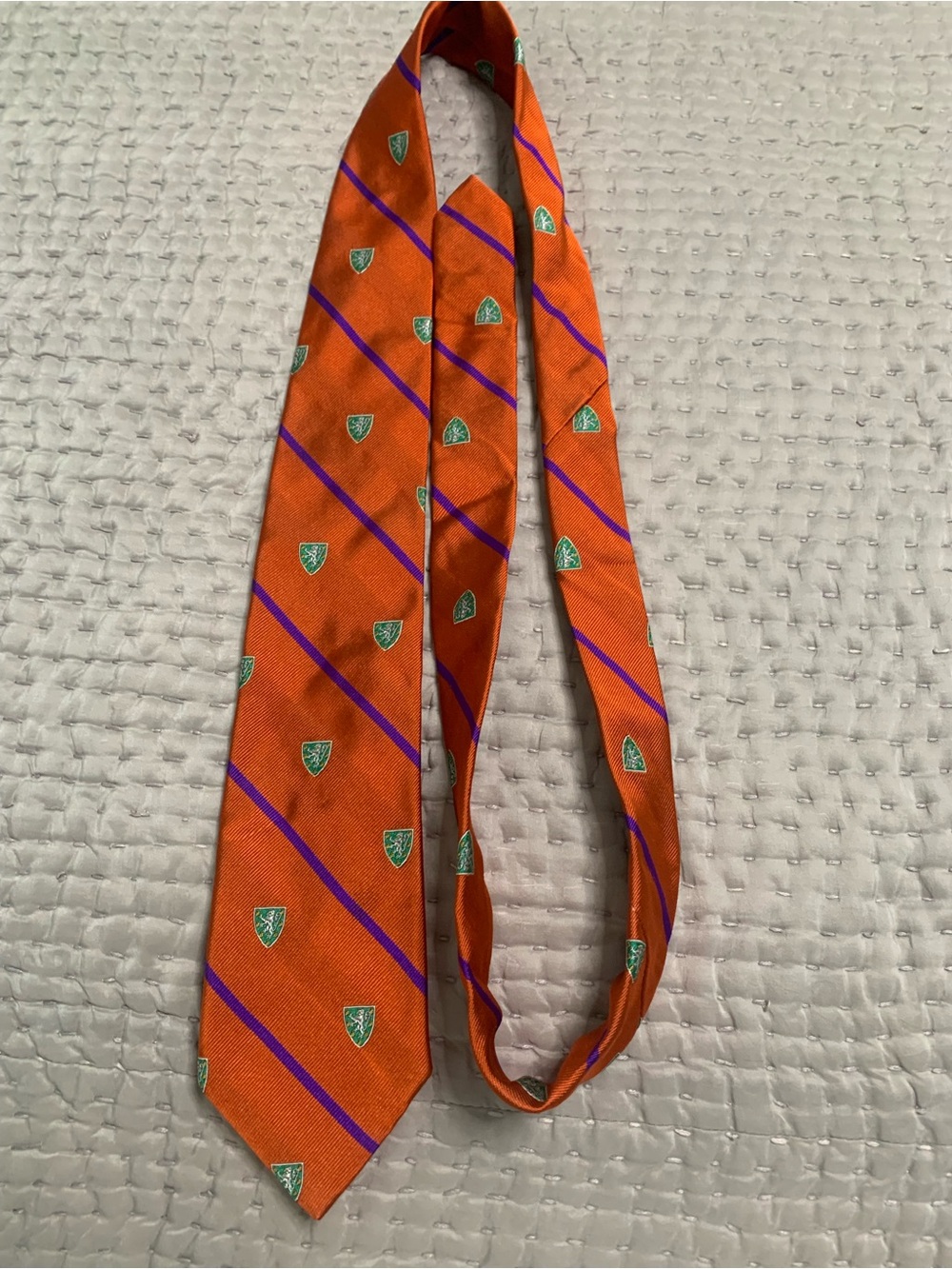 J. Crew Orange Tie with Purple Diagonal Stripes and Green Crest Accents